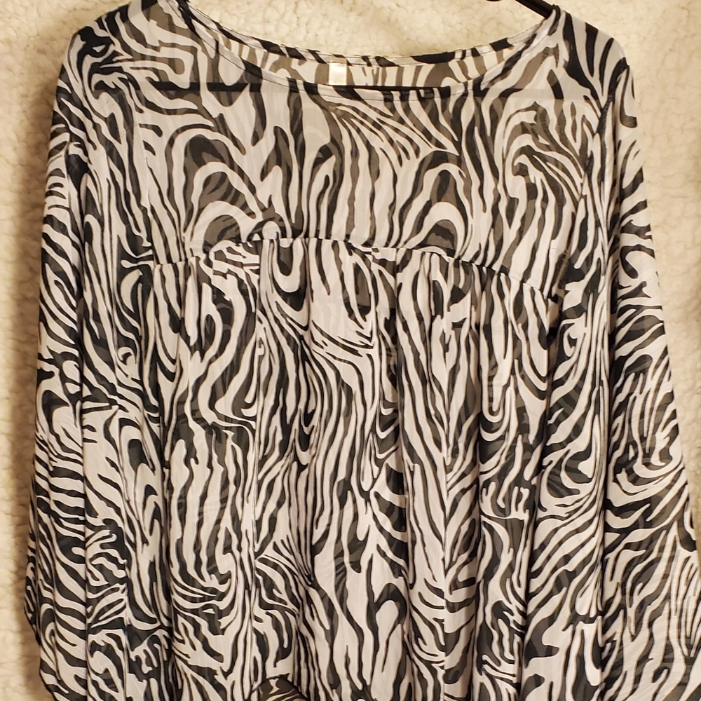 See through over shirt with large bell arms